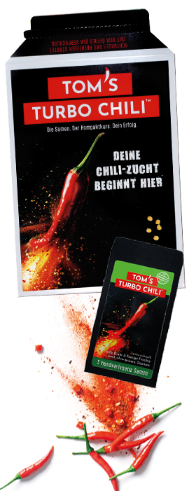Tom’s Turbo Chili Starterset mit Verpackung, Samenpäckchen und frischen Chilis – das Geschenk, das wächst und begeistert.